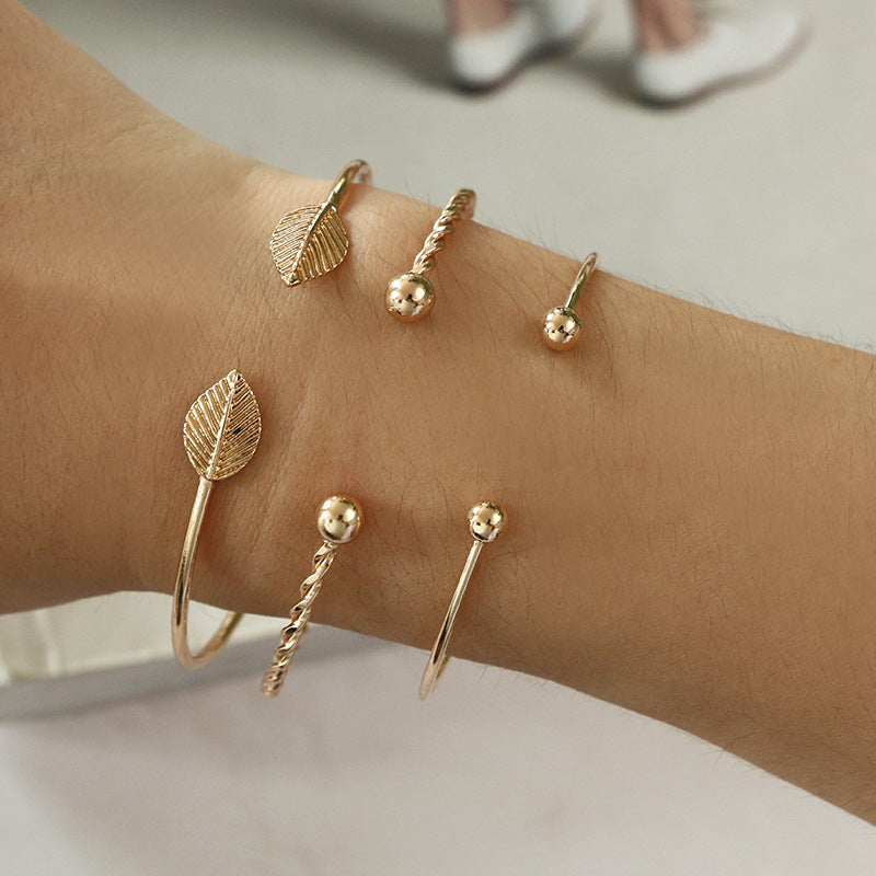 Elegant Gold Bohemian Leaf & Spiral Bangles Set – Perfect for Any Occasion