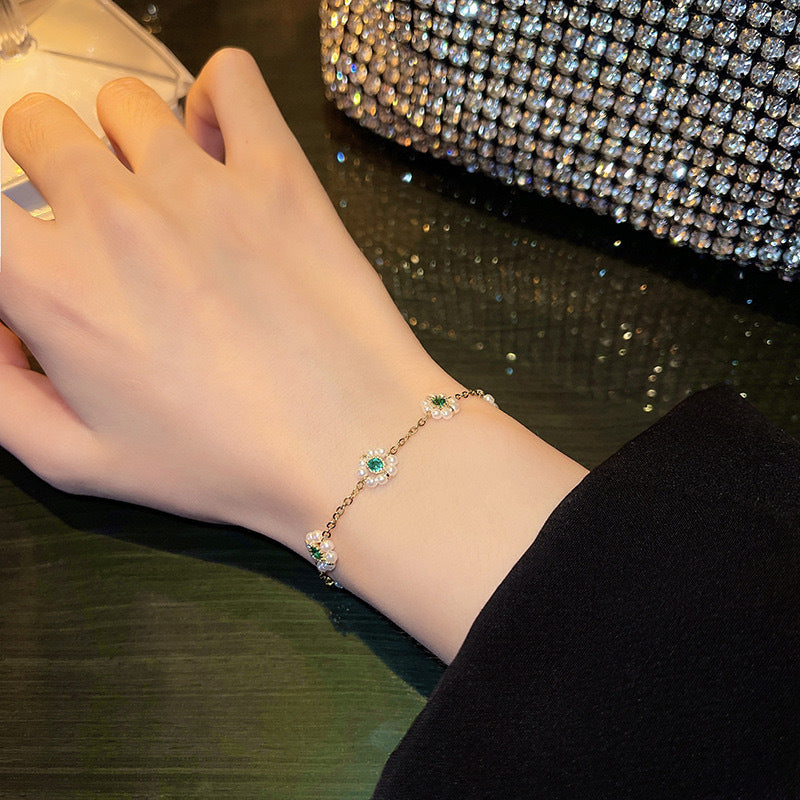 Dainty Pearl Daisy Bracelet | Adjustable Gold Chain with Green Gem Centre