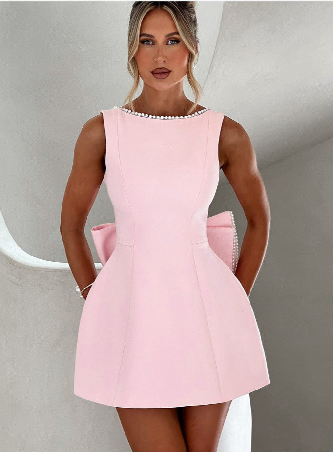Luxury Bow-Back Mini Dress with Pearl Detailing – Available in Various Colours