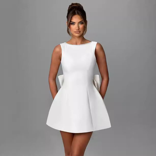 Luxury Bow-Back Mini Dress with Pearl Detailing – Available in Various Colours