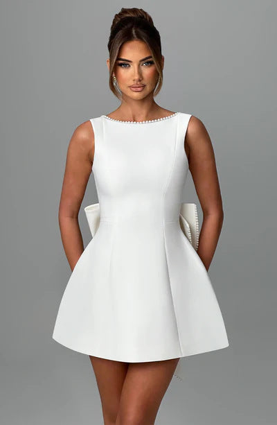 Luxury Bow-Back Mini Dress with Pearl Detailing – Available in Various Colours