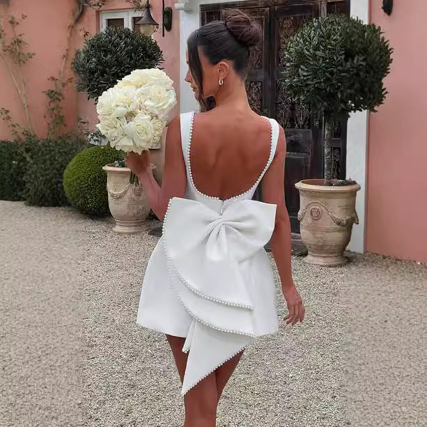 Luxury Bow-Back Mini Dress with Pearl Detailing – Available in Various Colours